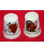 2 Vintage Souvenir Porcelain Sewing Thimbles DAIRY COW &amp; WILD TURKEY Gol... - $182.84 MXN