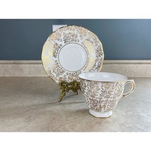 Queen Anne Gold Accented Floral Patterned Tea Cup And Saucer Set - $15.83