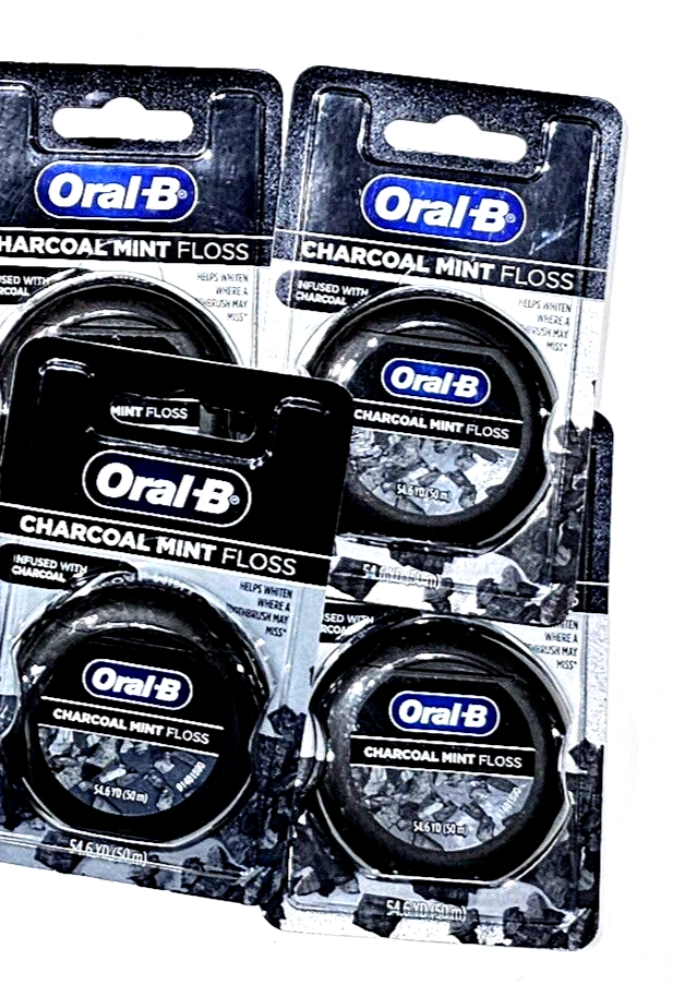 Primary image for 4 Packs Oral-B Charcoal Mint Floss Infused Helps Whiten 54.6yd