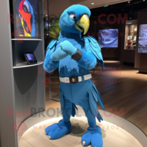 Sky Blue Macaw mascot costume character dressed with a Rash Guard and Smartwatch - $1,229.00