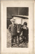 RPPC Young Boys Pose Proudly with Calf c1910 Postcard U19 - £7.80 GBP