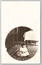 RPPC Cute Baby on Carpet with Antique China Doll Round Masked Photo Postcard F26 - £10.92 GBP