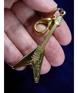 (M-304-D) GIBSON FLYING V Guitar gold CHARM clip phone Jewelry I love gu... - $233.50 MXN