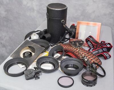 Primary image for Vintage Lot of Camera Cases Hoods Filters Straps etc. (g25)