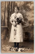 RPPC Pretty Young Girl Flower Bouquet Fur Rug Studio Photo Postcard D26 - £7.43 GBP