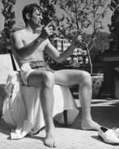 Jean-Paul Belmondo cool pose in swimwear seated on chair 1960's 16x20 Canvas Gic - £55.94 GBP