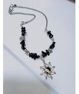 Sunshine Necklace with Black Beads and Butterfly Silver Accents Sun Pendant - $23.46