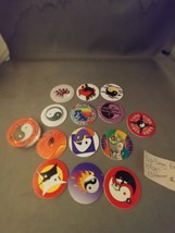 13 Pogs and 1 Slammer Ying and Yang Pogs  - $2.80