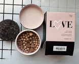 AVON FMG Avon Love Glow Beads Illuminating Powder Wild Hearts - $20.00