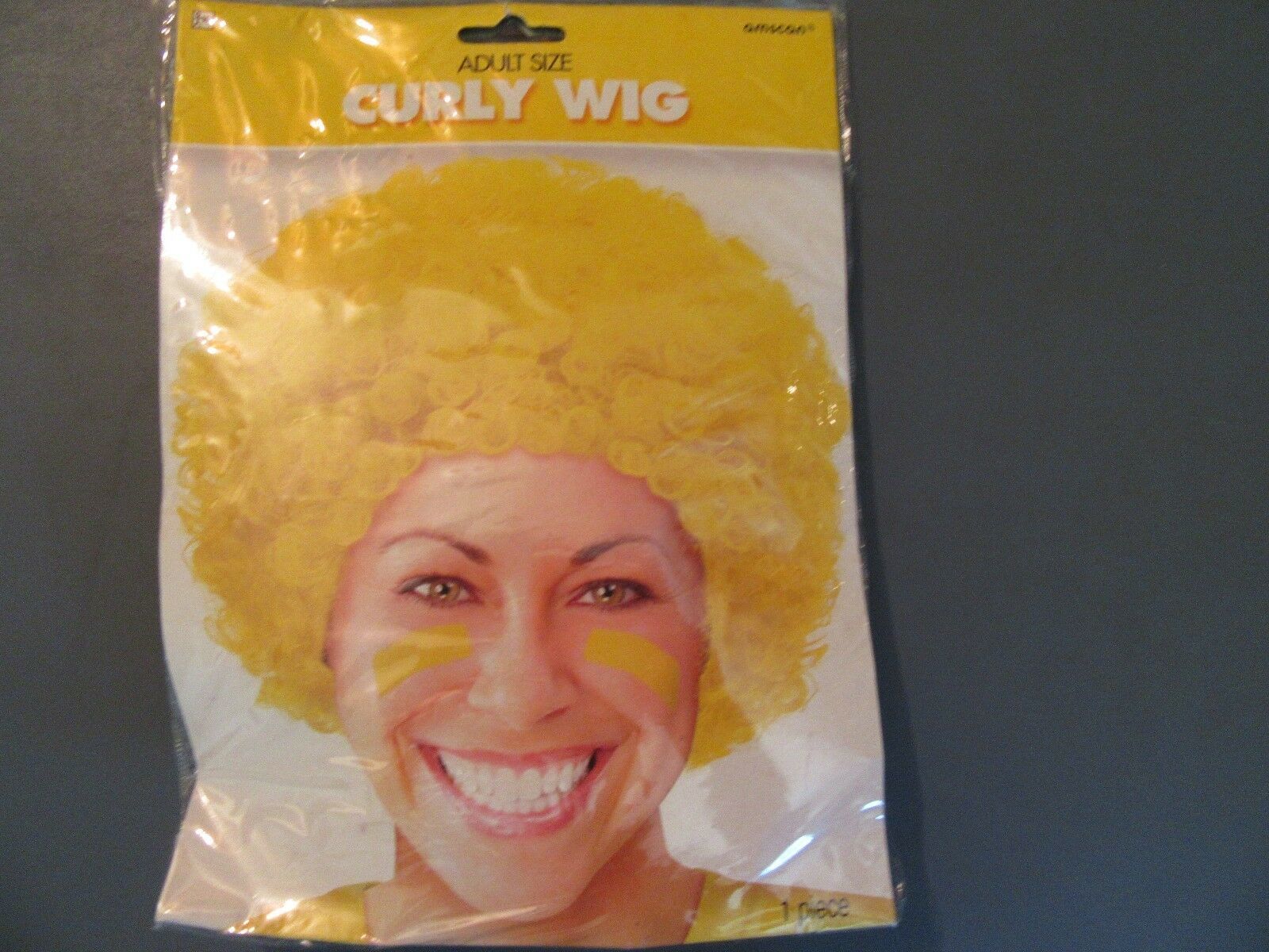 Curly Wig Yellow Adult Size - $6.44