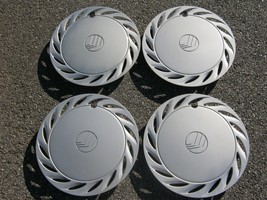 Genuine 1992 to 1998 Mercury Tracer 14 inch hubcaps wheel covers - $51.08