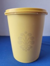 Tupperware Yellow Servalier Canister 6&quot; Tall 811-13 W/ Starburst Lid VGUC - $13.46