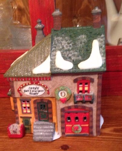 North Pole Series "Orly's Bell & Harness Supplies" Department 56. RETIRED. LNIB - $14.80