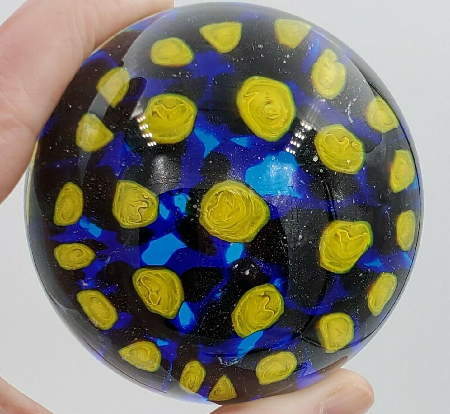 Art Glass Paperweight Dark Blue with Yellow Flowers unsigned 2.5&quot; - $18.80