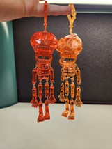 Vintage Fun World Pull String Chattering Skeletons Neon Orange Red Hanging - £14.89 GBP