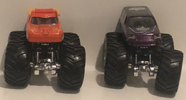 Hot Wheels Monster Jam truck Lot of 2 El Toro Loco Scarlet Bandit - $8.90