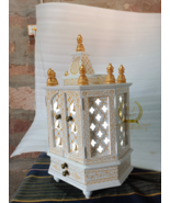 The temple is made of wood and white in color. It has 1 drawers, 1 puja she - $452.78 CAD+
