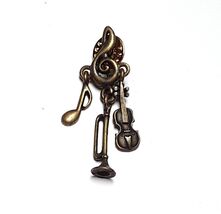 JJ Jonette Brooch Pin Horn Violin Musical Note Dangling Charms Brass Ton... - $12.86