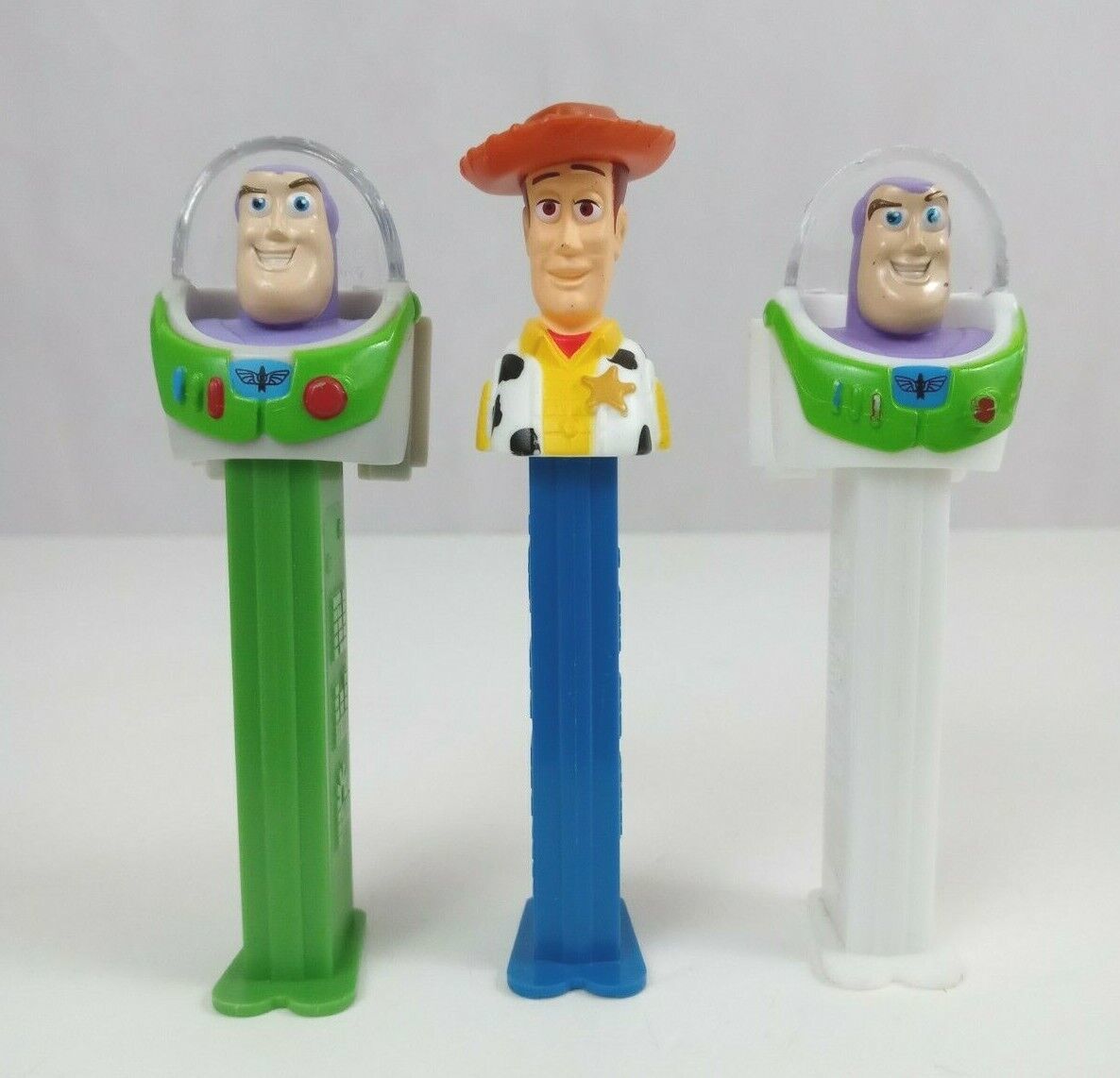 Primary image for Vtg Lot of 3 Toy Story 4.5" Pez Dispensers Woody & Two Different Buzz Lightyears