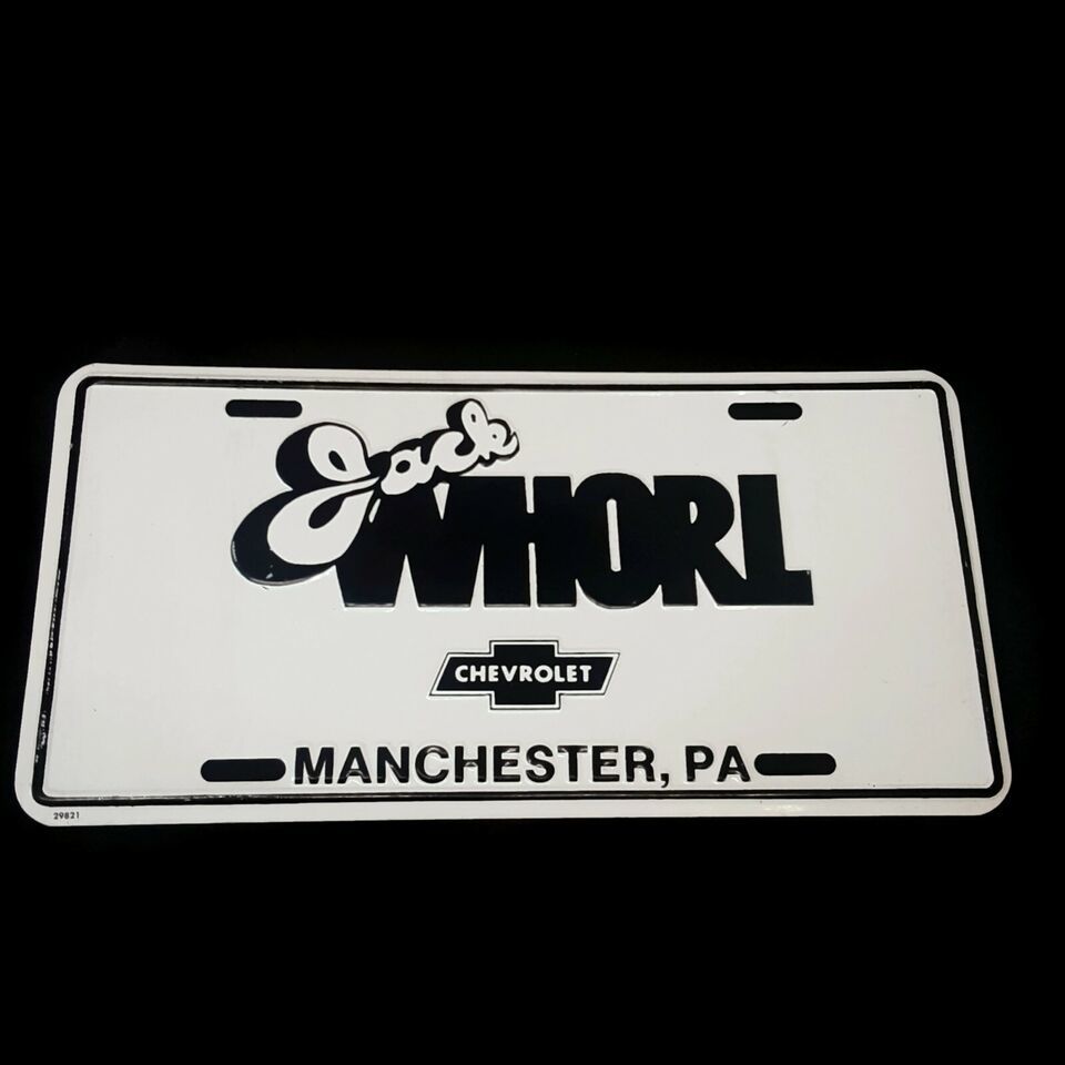 Vintage Chevrolet License Plate Manchester PA Jack Whorl 1970&#39;s White Black - $12.60