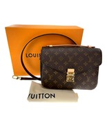 Authenticity Guarantee 
Louis Vuitton Pochette Metis Monogram Bag - Bran... - $3,569.96