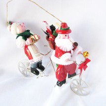 Vintage Santa and Mrs. Claus Riding bike Holiday Ornament 1990s - £9.38 GBP