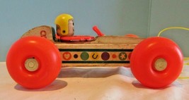 Fisher Price Vintage  # 8 Fisher Price Bouncy Racer pull along - $18.00