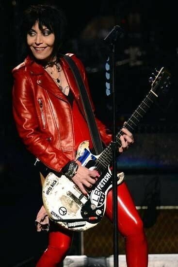 Joan Jett smiling in red leather jacket and pants playing guitar 4x6 inc... - $4.75
