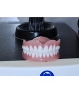 Full upper and lower dentures/false teeth, Brand new. - $135.00