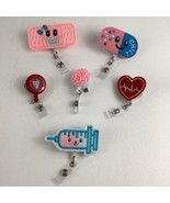 Healthcare Nurse Badge Lot Reels Holders Bandaid Pill Syringe Heart Retr... - $44.61 CAD