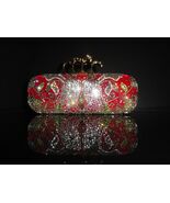 Alexander McQueen Red  Jeweled knuckle clutch - $105,644.54 MXN