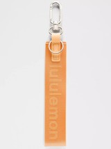 LULULEMON NEVER LOST KEYCHAIN  ROCK MELON LIT ORANGE NWT FREE SHIP - $54.40