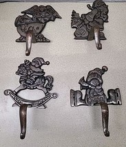 Vtg Heavy Cast Iron Santa Claus  Christmas Mantle Stocking Holder Set Of  4 - $69.89