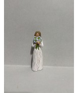 Woman Holding A Blue Bouquet of Flowers - $18.00
