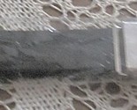 BELT WEB  1 12 WIDE WITH SILVER COLORED BUCKLE - $4.00