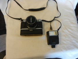 Vintage Canon AE-1 35mm SLR Film Camera with FD 50 mm lens, Flash, Power Winder - $665.00