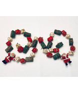Vintage Avon Gift Collection Christmas garland flocked Santa gift packag... - $12.00