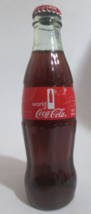 Coca-Cola WORLD OF COCA-COLA 2014 8oz Bottle - $1.49