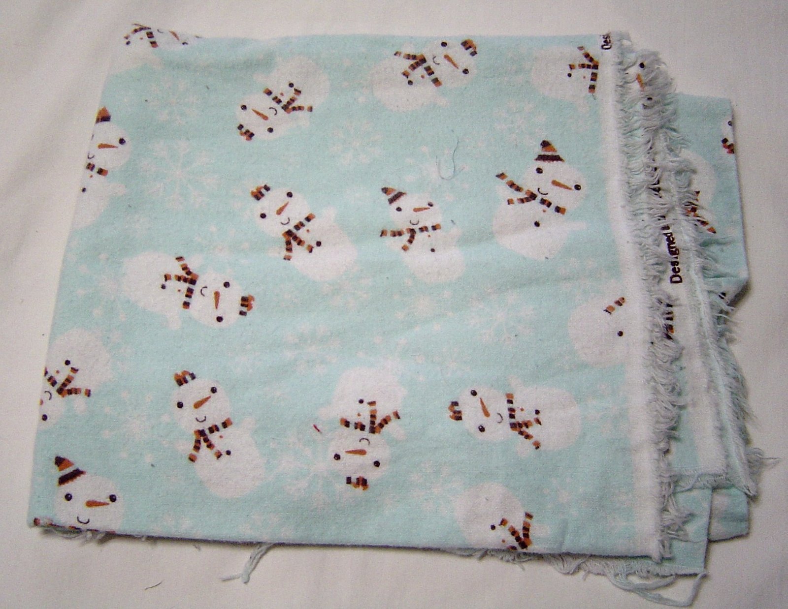 Happy Snowmen with Orange Striped Scarfs Flannel Print Fabric  - $7.99