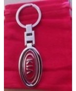 2 Kia keychains - $372.79 MXN