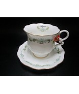 Maruri Masterpiec tea cup and saucer with ceramic rose - $34.65