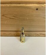 Mini Plastic Coca Cola Gold Keychain Fob - $366.69 MXN