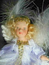 Porcelain Angel Doll Ornament Wings Light Purple Dress Feathers on her W... - $9.50