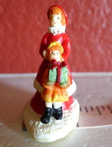 Grandeur Noel Christmas Miniature Village Mother Lil Girl with gift 1995 vintage - $11.39