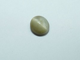 Natural Grey-Green Cat&#39;s Eye Loose Gemstone 3.9 Carat Oval Cabochon Cut - $1,280.93 MXN