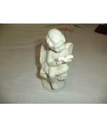 White Opalescent Angel Figurine Holding Bible - $16.35 CAD