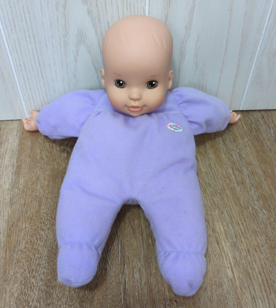 Primary image for Zapf Baby Born baby doll vinyl head purple soft body brown eye Loves to Tumble