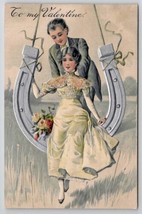 PFB Valentine Romance Man With Woman On Horseshoe Swing Embossed Postcard W26 - £11.76 GBP