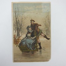 Victorian Trade Card Man Ice Skates Woman in Sled Boston &amp; Meriden Cloth... - $9.99