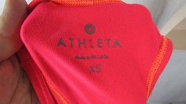 Women&#39;s Athleta athletic tank top XS racerback coral or melon pink orange trim - £10.86 GBP